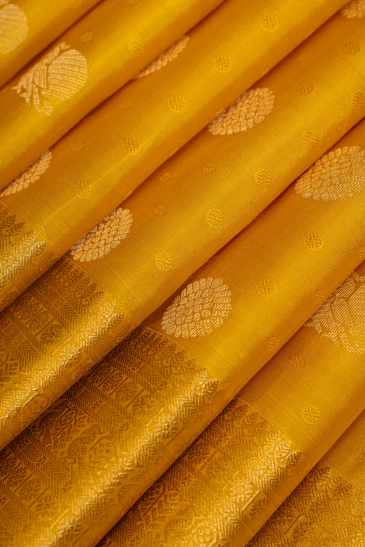 Golden yellow pure Kanchipuram silk saree