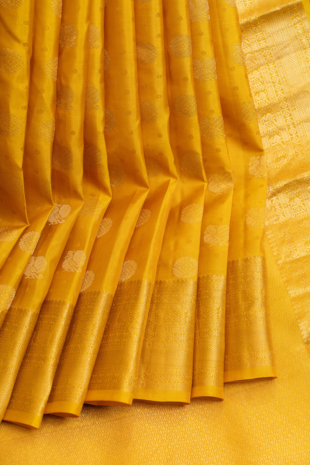 Golden yellow pure Kanchipuram silk saree