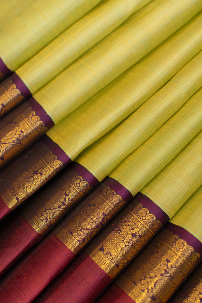 Chartreuse green rettai pettu pure zari Kanchipuram silk saree