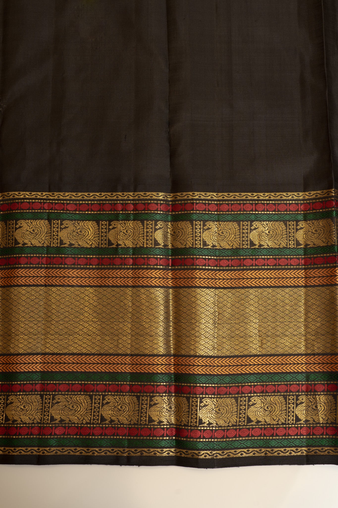 Champagne gold and black pure zari Kanchipuram silk saree