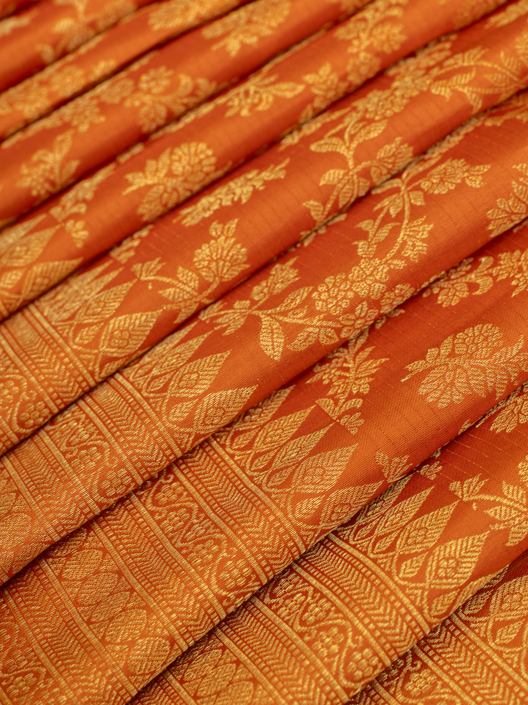 Rust orange floral brocade pure Kanchipuram silk saree