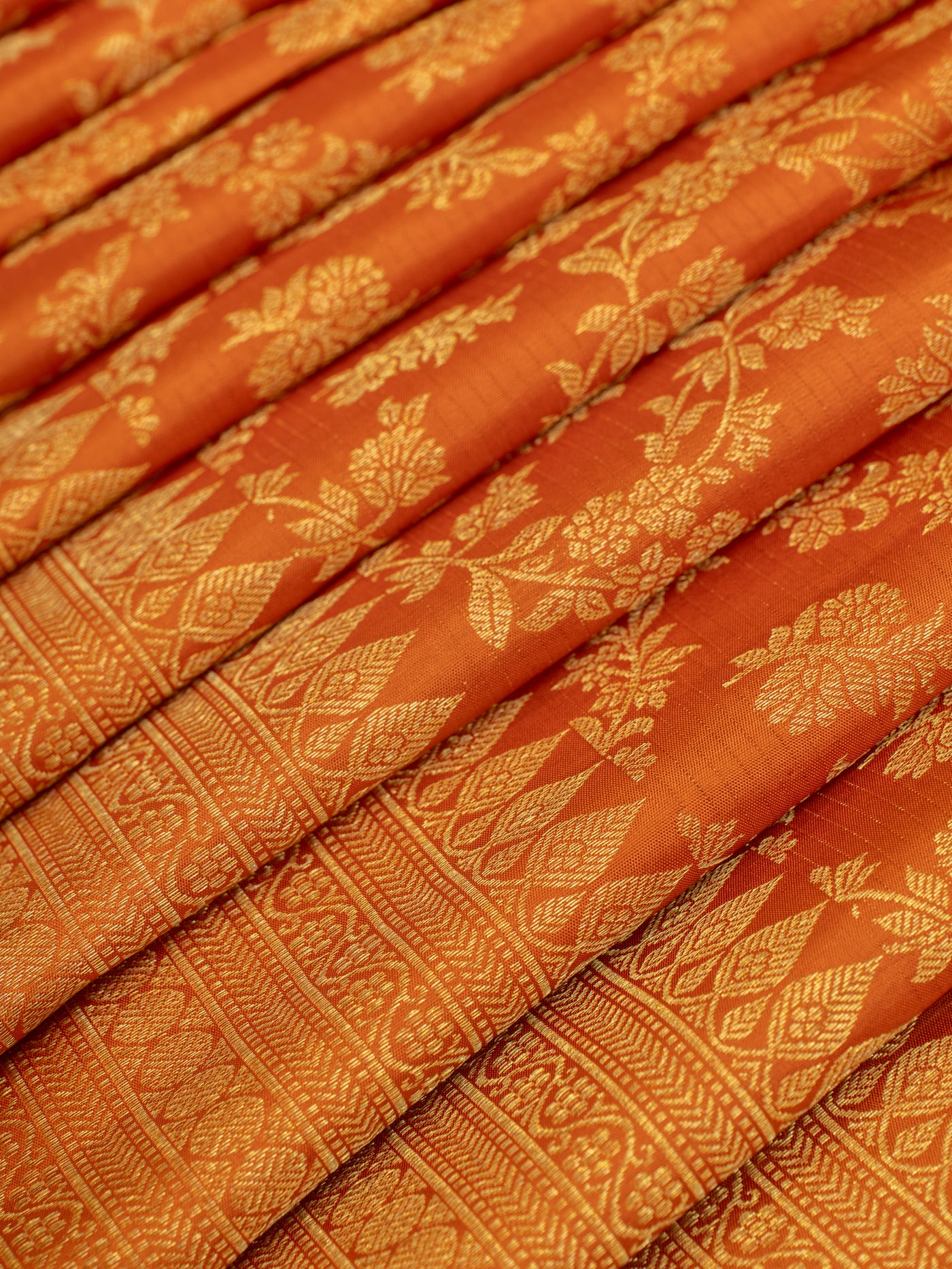 Rust orange floral brocade pure Kanchipuram silk saree