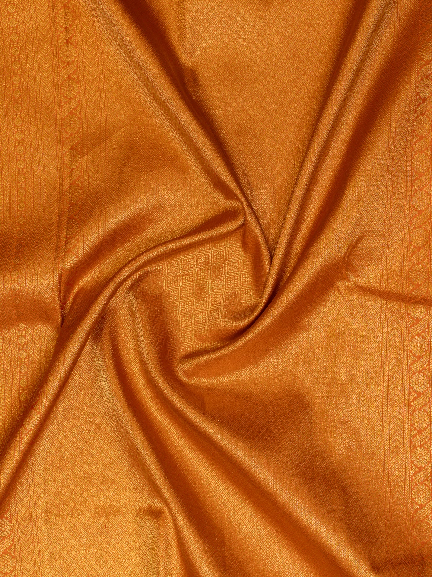 Rust orange floral brocade pure Kanchipuram silk saree