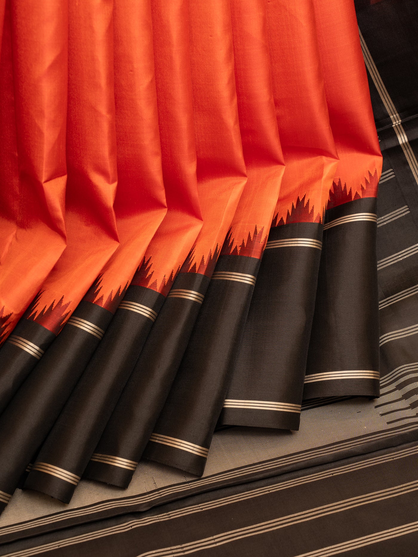 Orange and black without zari pure Kanchipuram silk saree