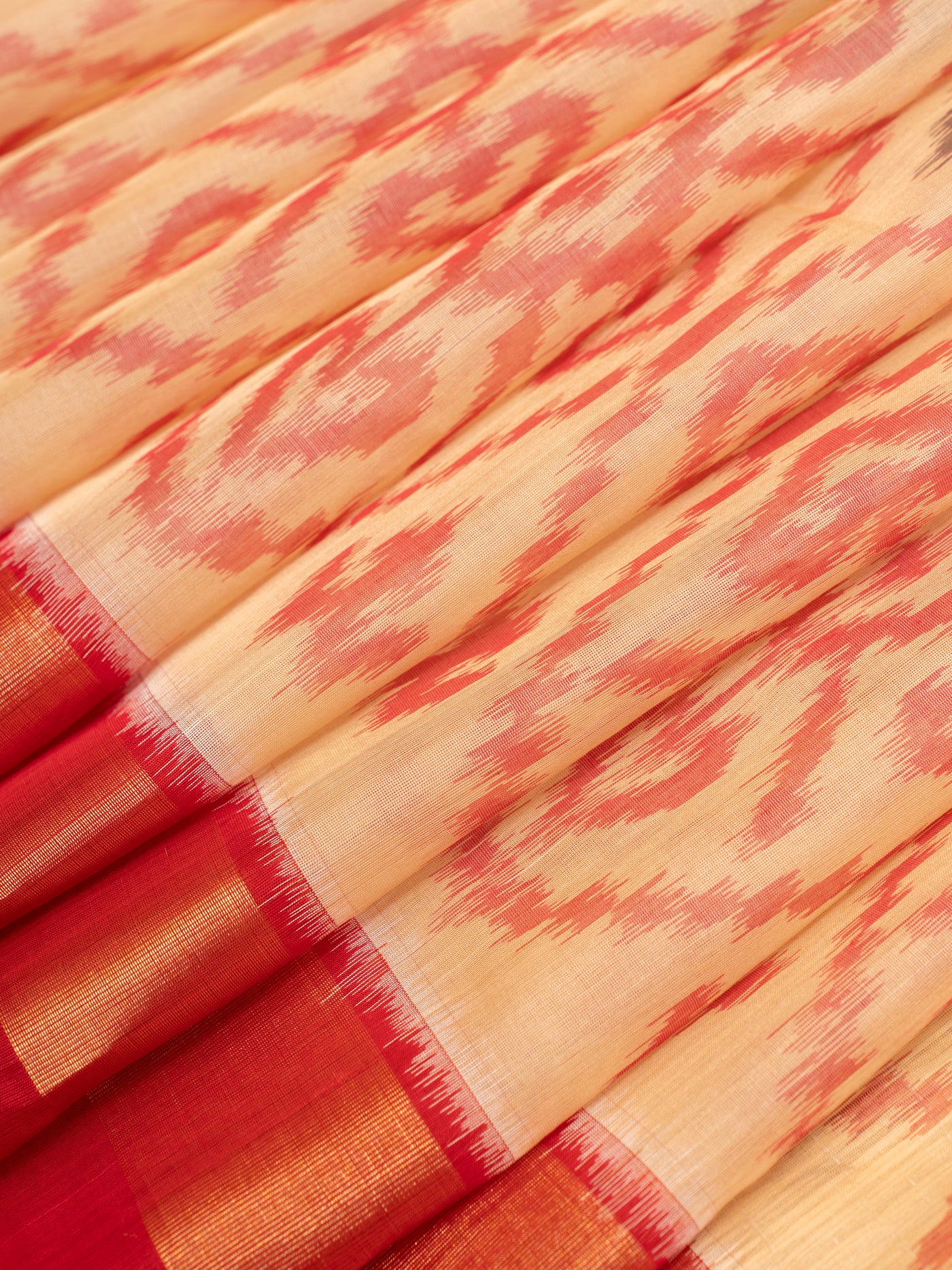 Cream ikat pure silk cotton saree