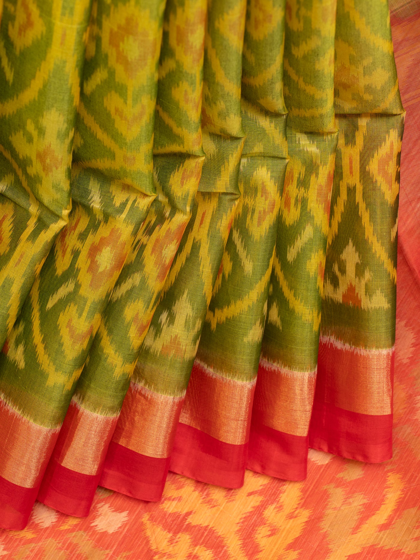 Mehendi green pure ikat silk cotton saree