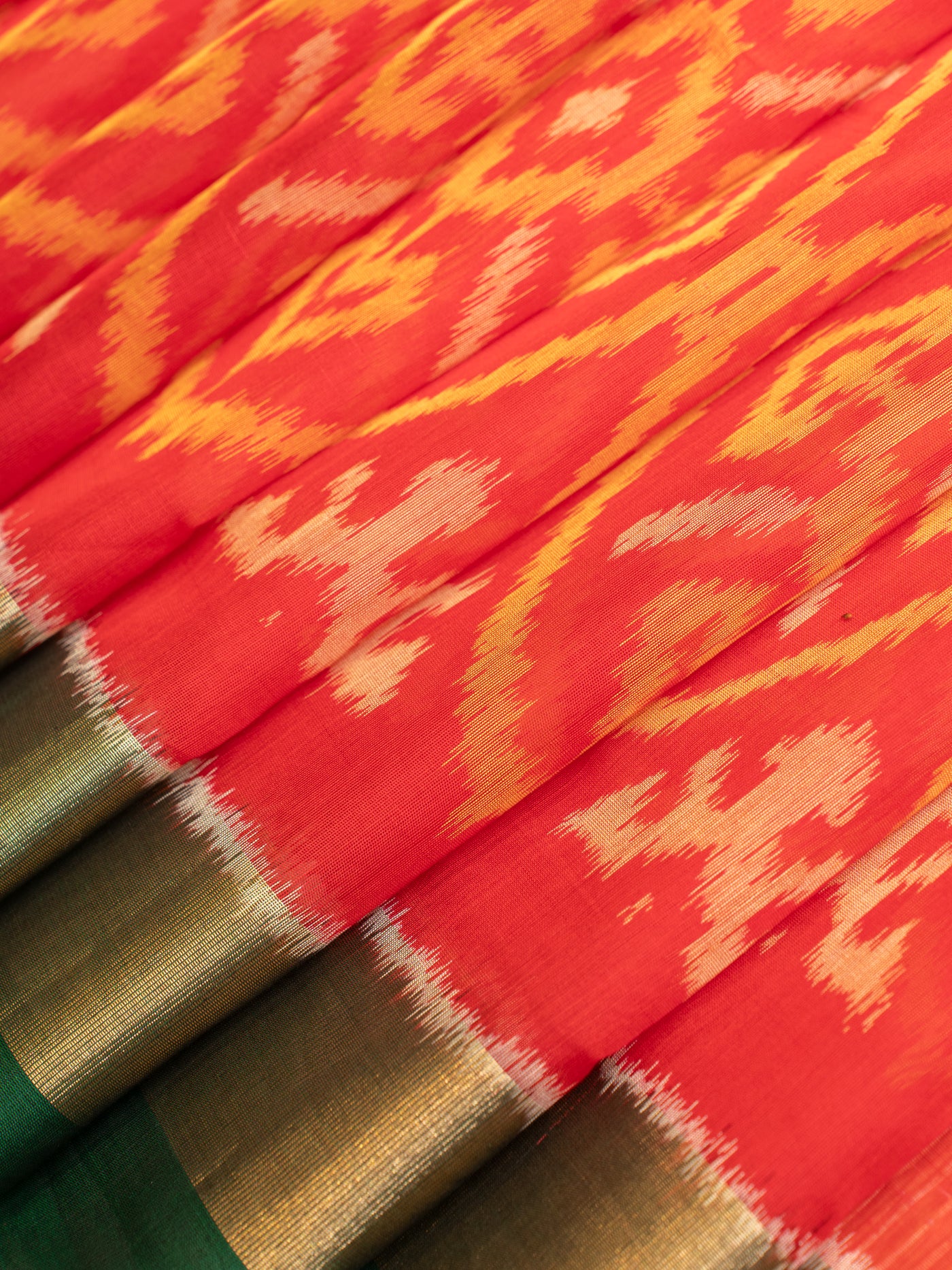 Red and green pure ikat silk cotton saree