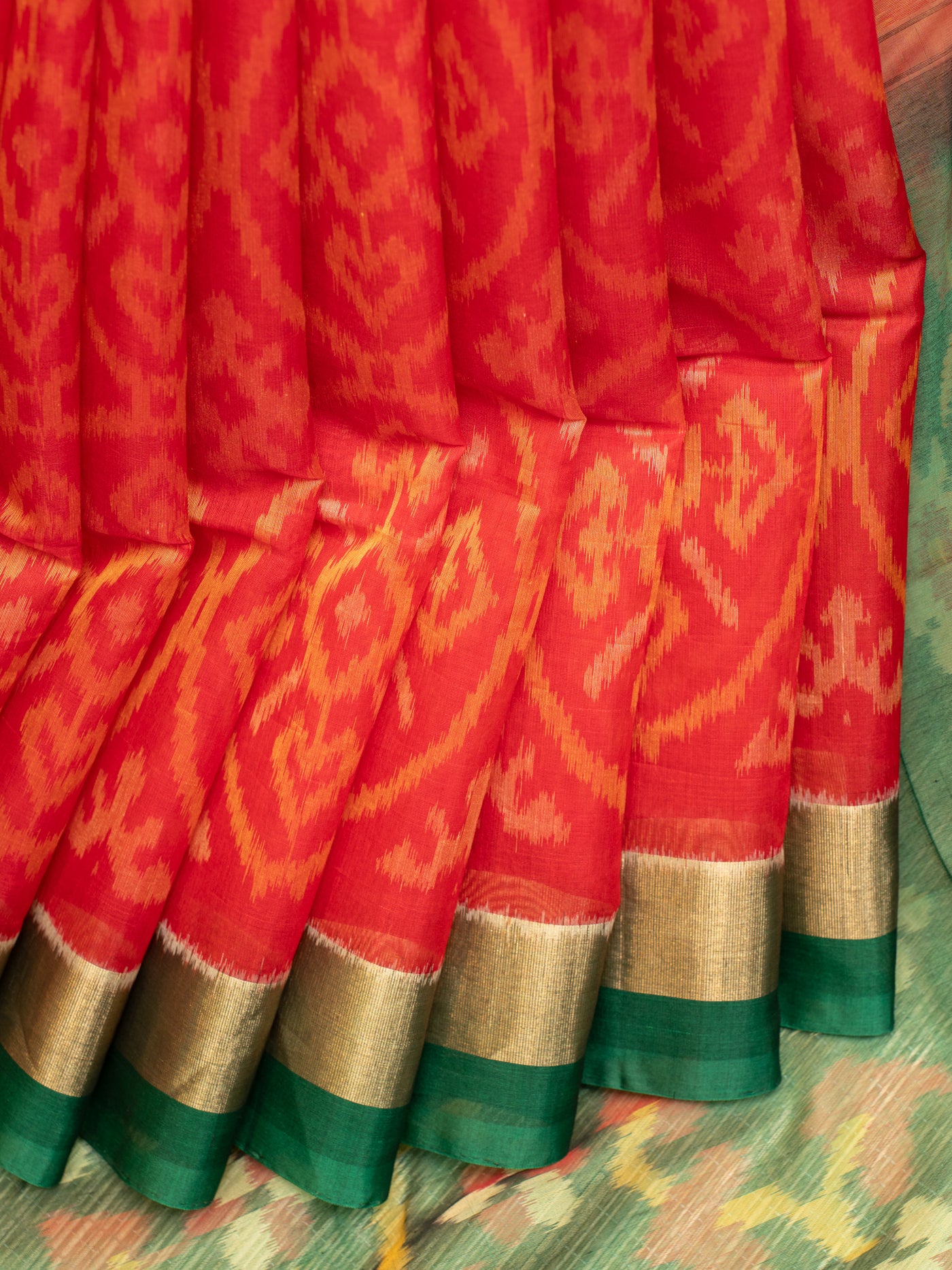 Red and green pure ikat silk cotton saree