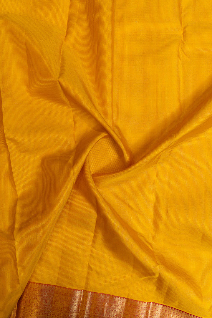 Yellow and peach traditional pure Kanchipuram silk saree