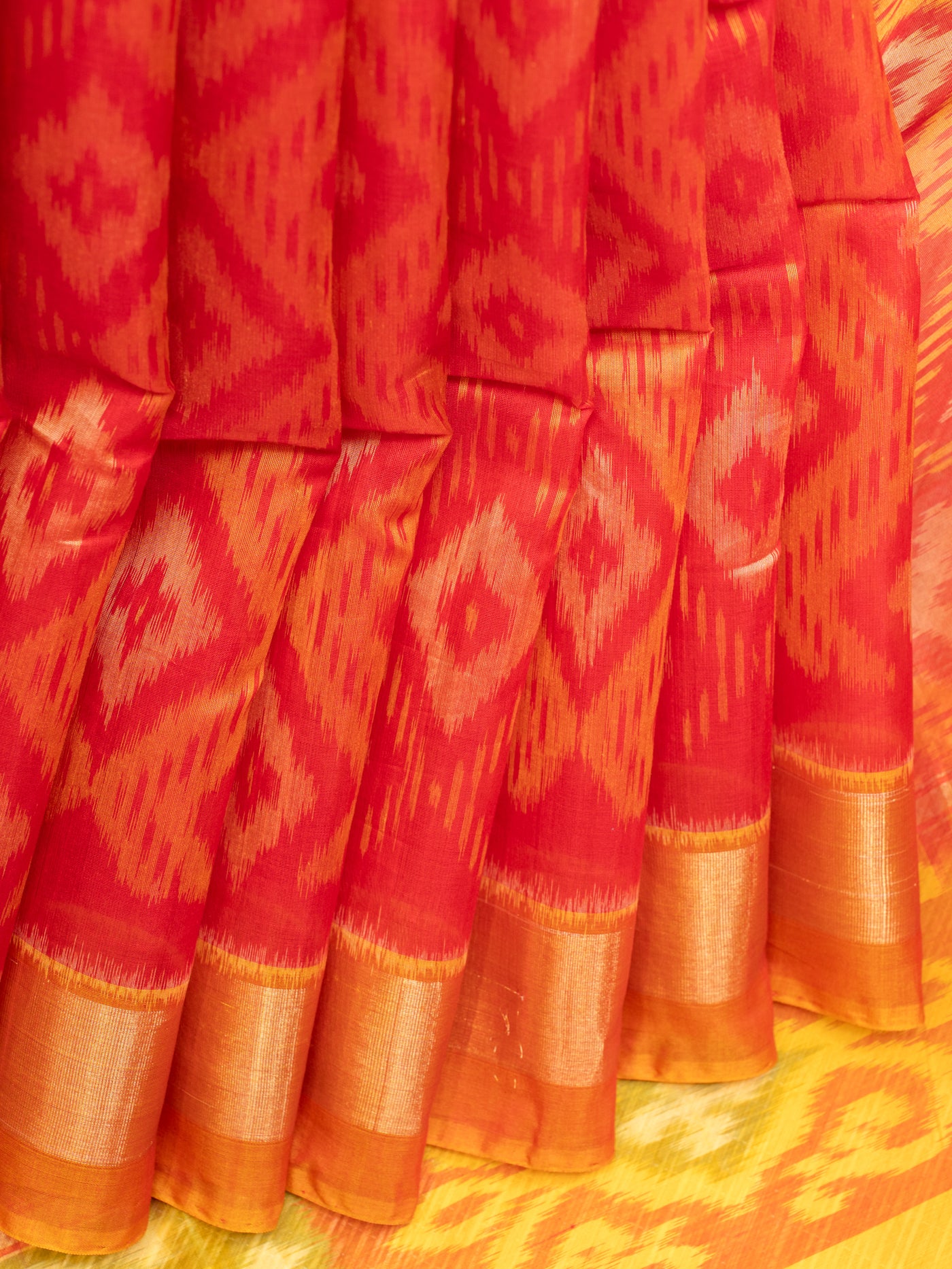 Red and mustard pure ikat silk cotton saree