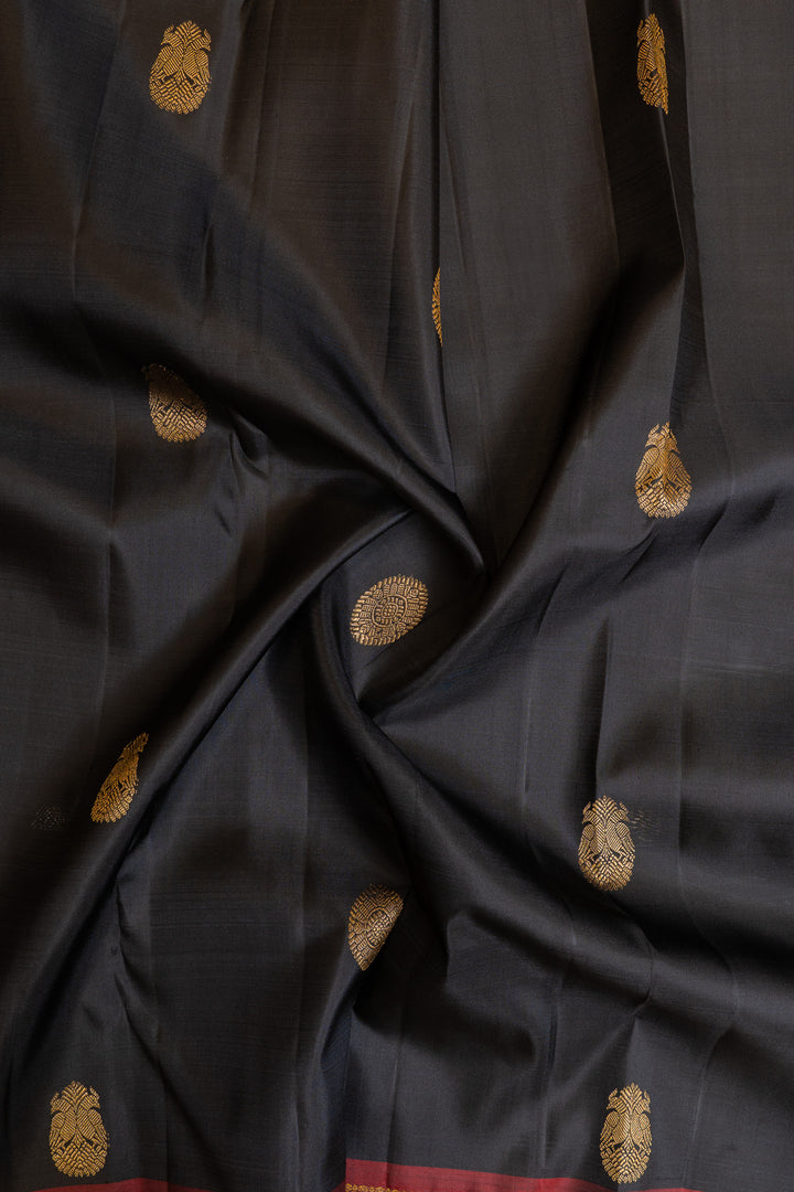 Black and maroon iruthalaipakshi pure Kanchipuram silk saree