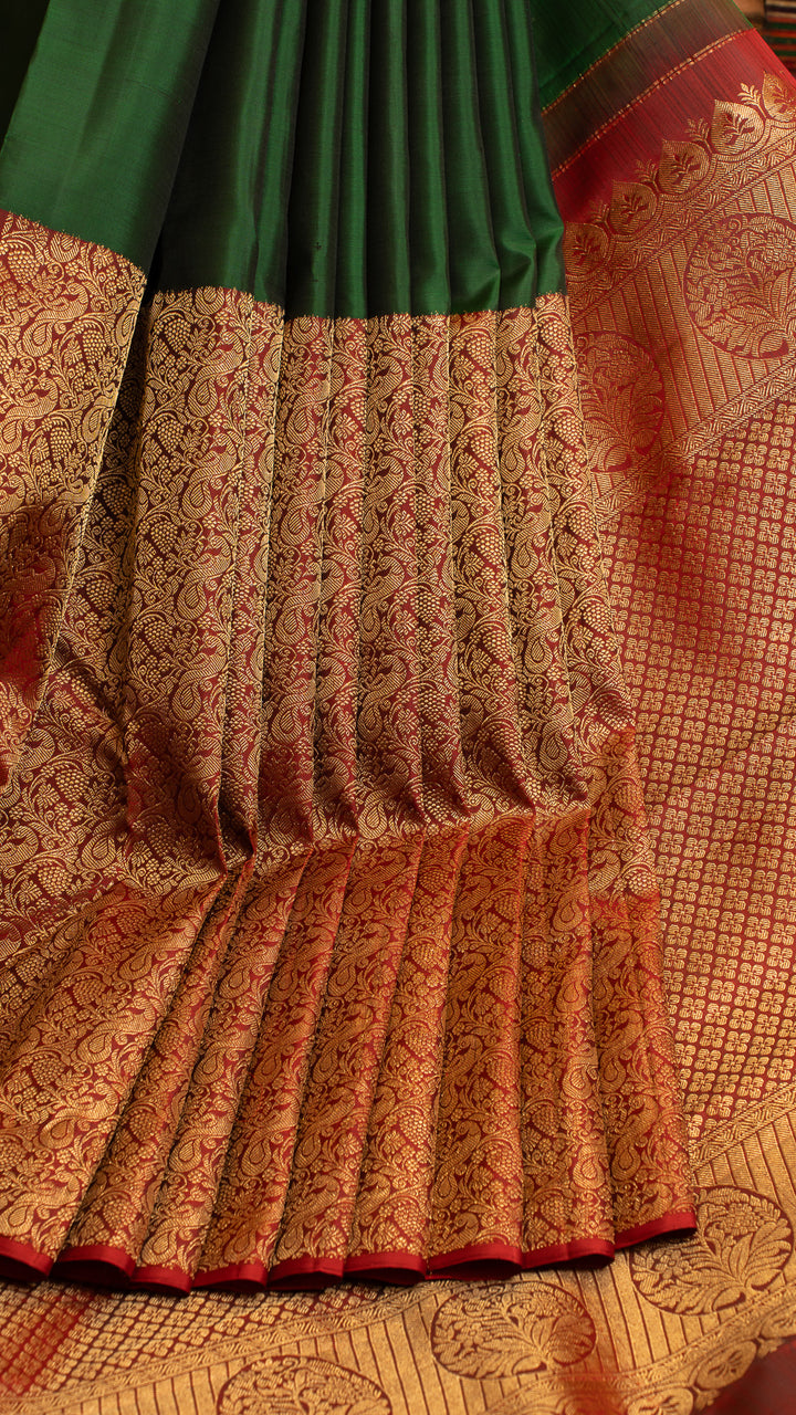 Bottle green and Maroon half and half pure Kanchipuram silk saree