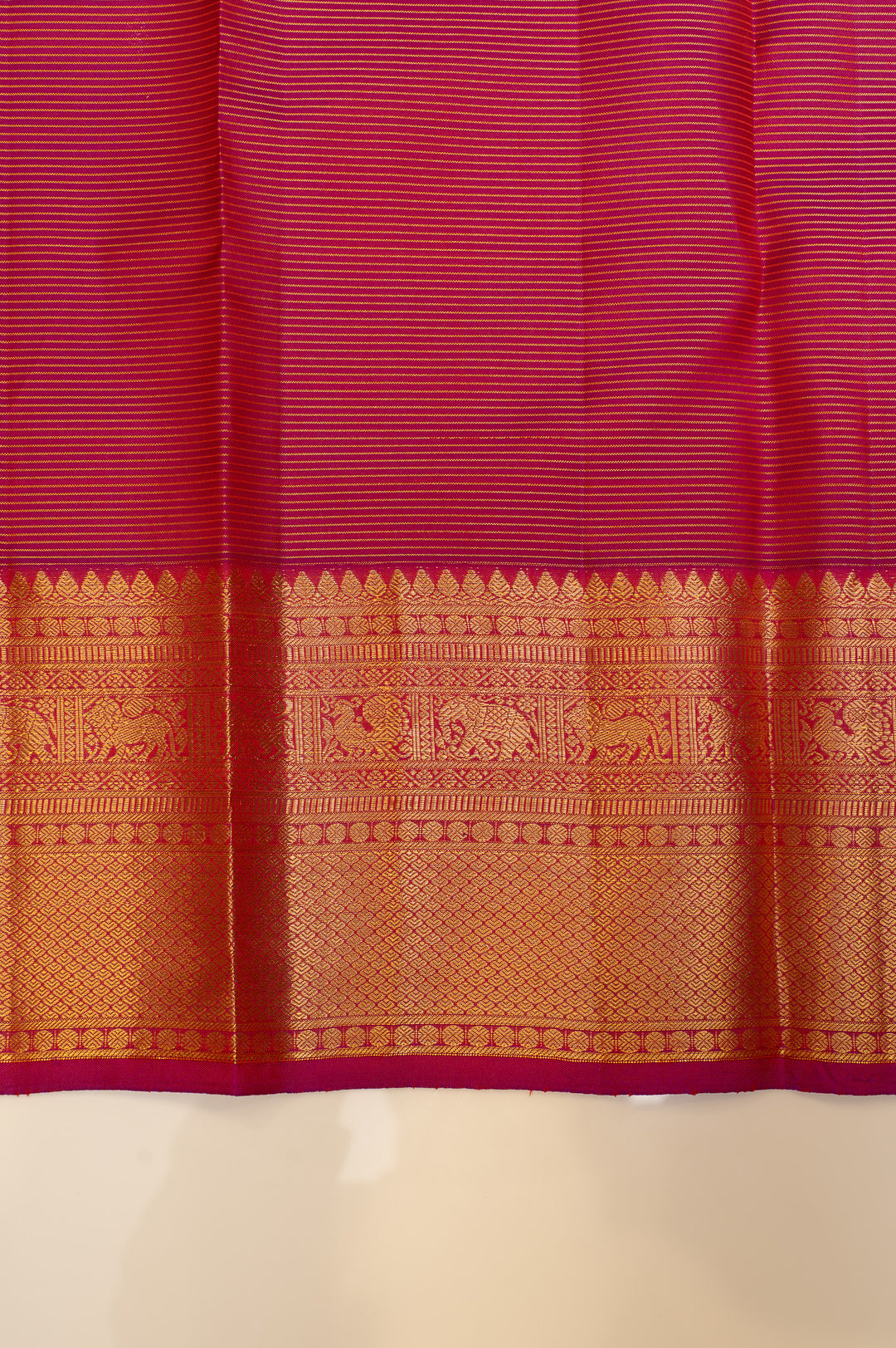 Reddish orange muthuzari pure Kanchipuram silk saree
