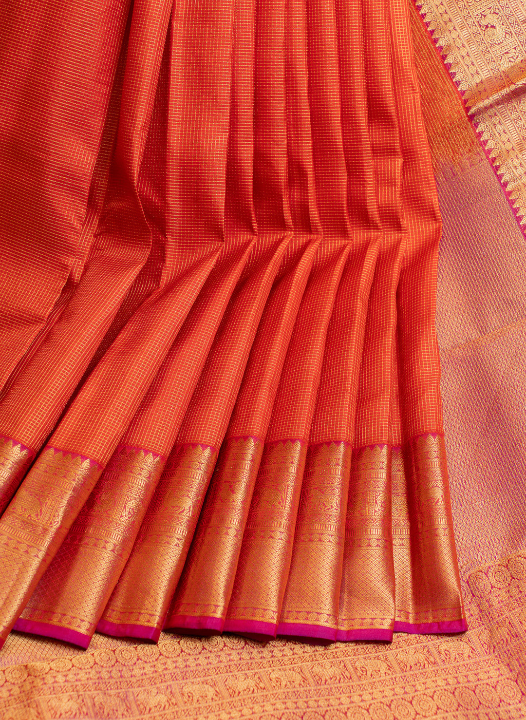 Reddish orange muthuzari pure Kanchipuram silk saree