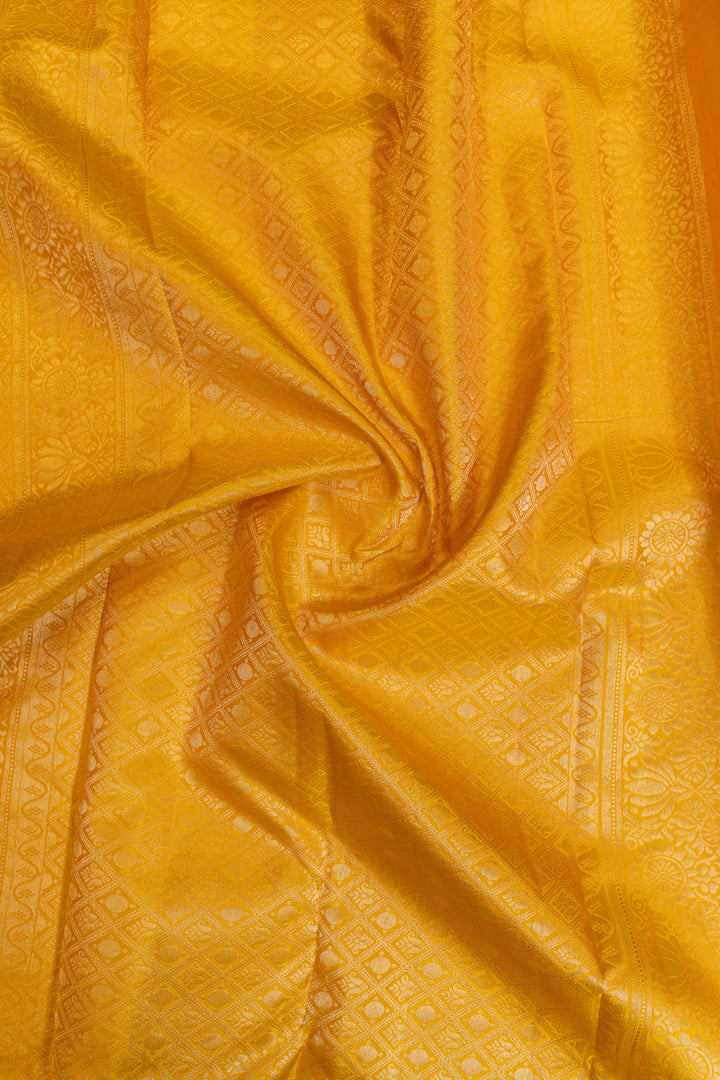 Yellow diamond brocade pure Kanchipuram silk saree