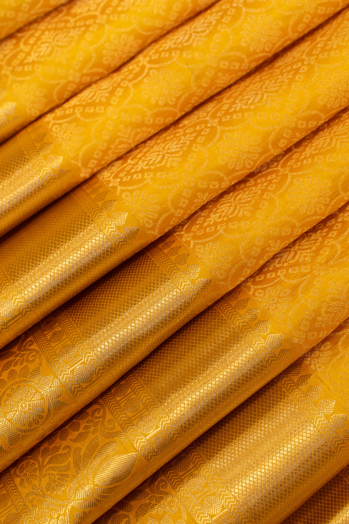 Yellow diamond brocade pure Kanchipuram silk saree