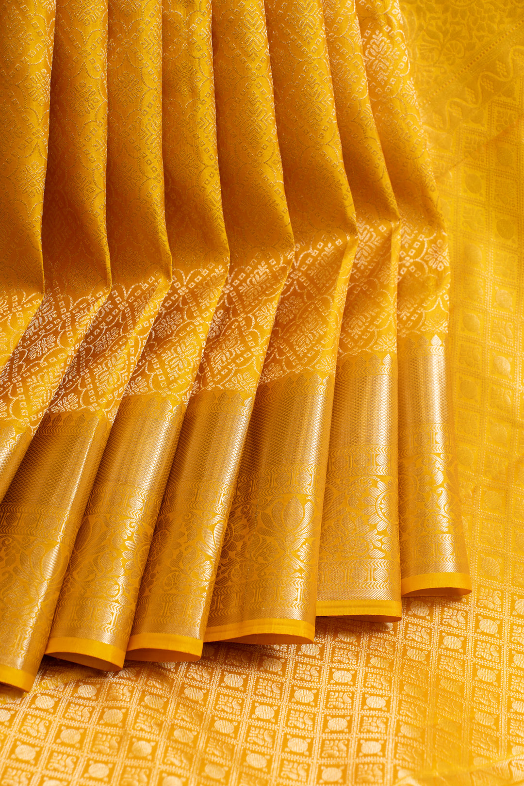 Yellow diamond brocade pure Kanchipuram silk saree