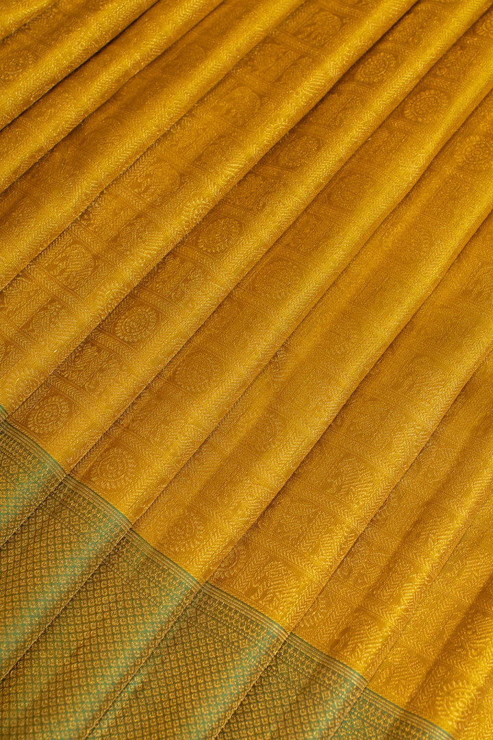 Gold and green annam chakram Brocade pure Kanchipuram silk saree