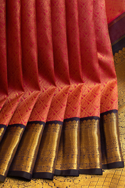 Reddish pink korvai brocade pure zari Kanchipuram silk saree