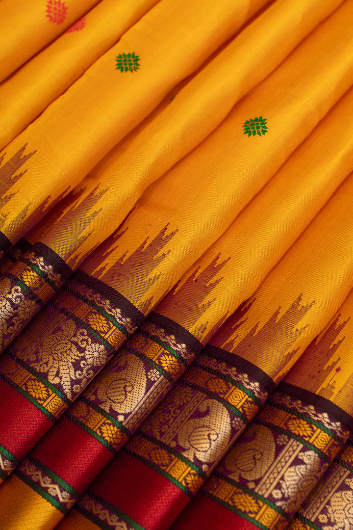 Yellow and brown threadwork Kanchipuram silk saree