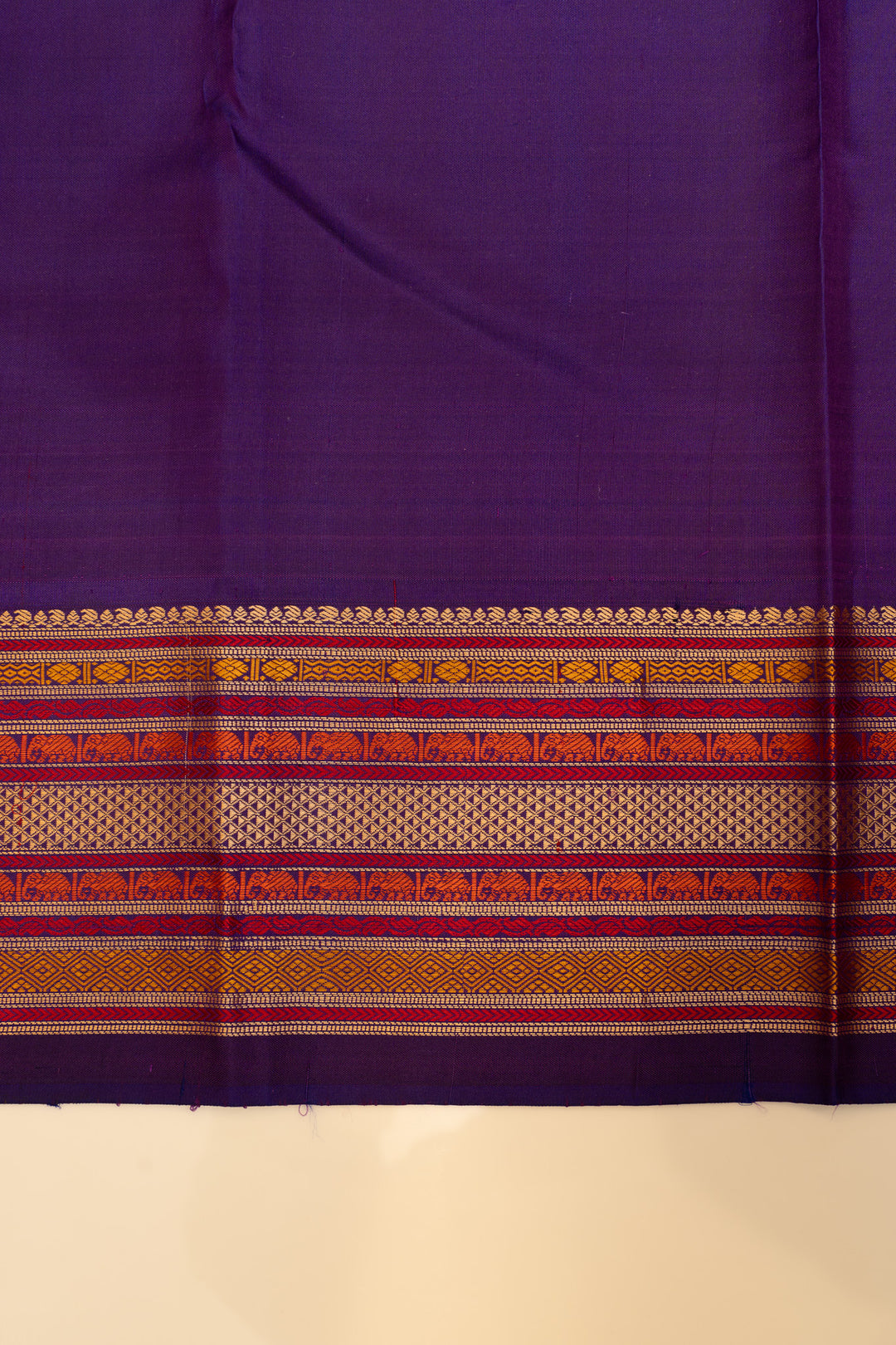 Mustard yellow and purple threadwork Kanchipuram silk saree