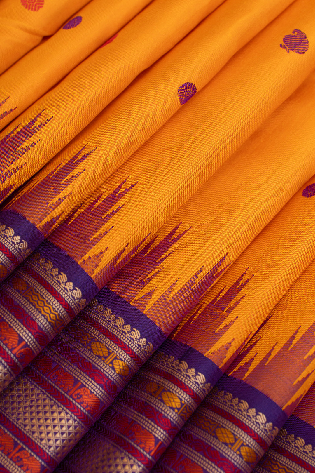 Mustard yellow and purple threadwork Kanchipuram silk saree