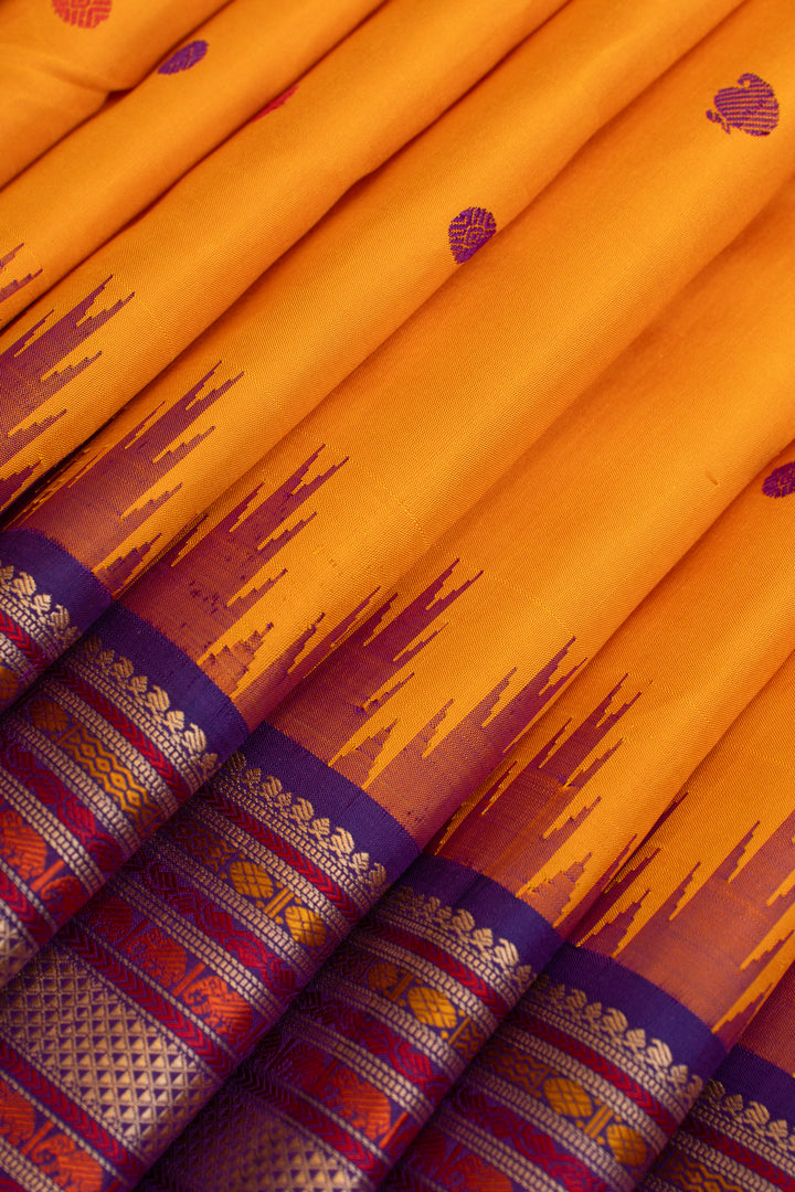 Mustard yellow and purple threadwork Kanchipuram silk saree