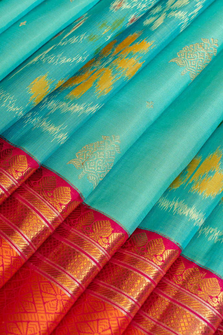 Peacock blue and peach ikat kanjivaram pure silk saree