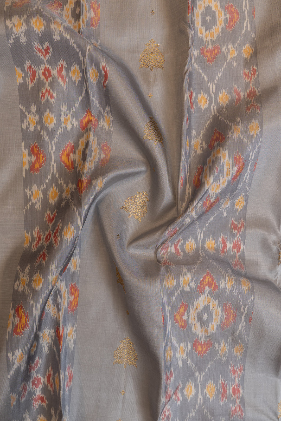 Grey ikat and peach ikat  Kanchipuram pure silk saree
