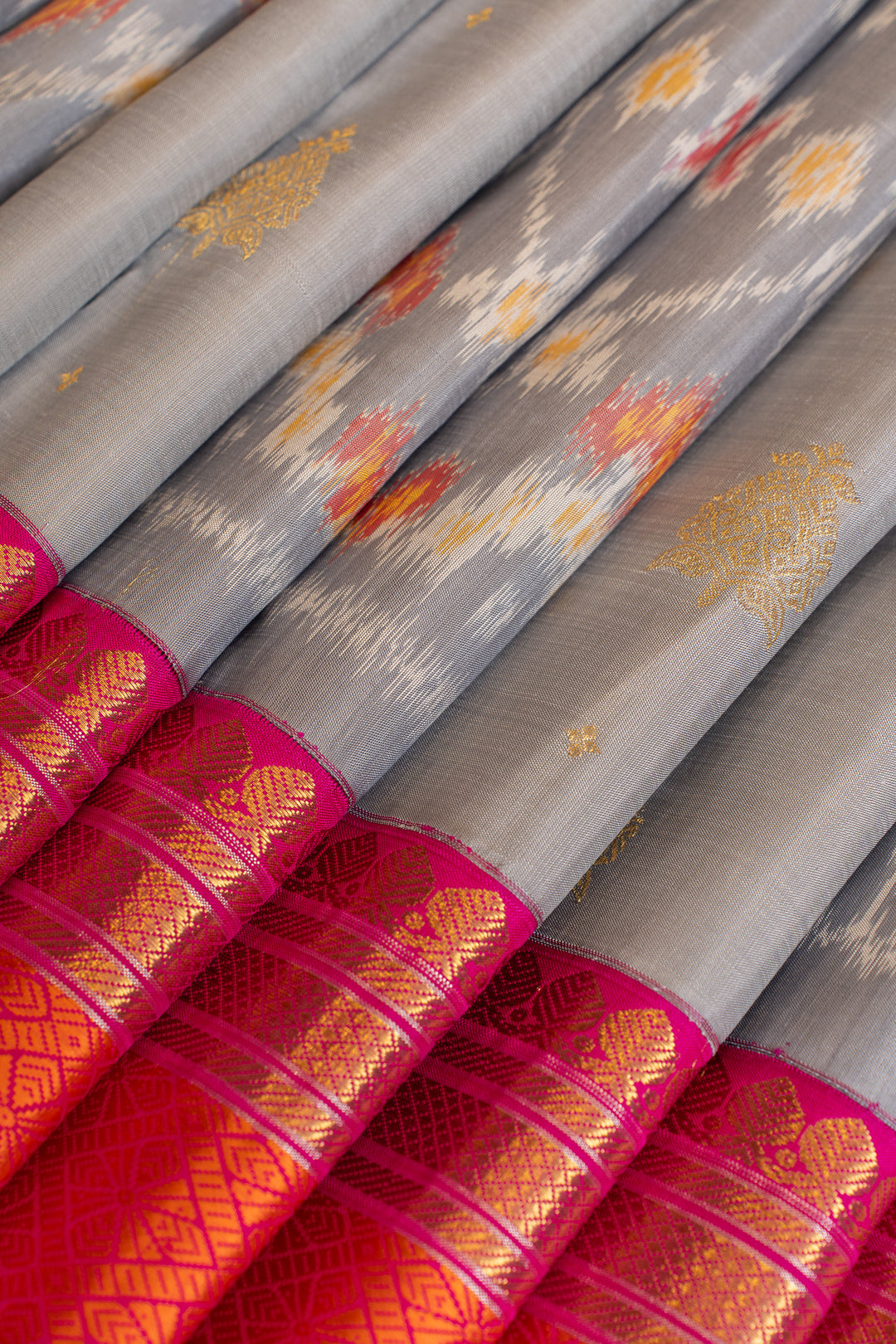 Grey ikat and peach ikat  Kanchipuram pure silk saree