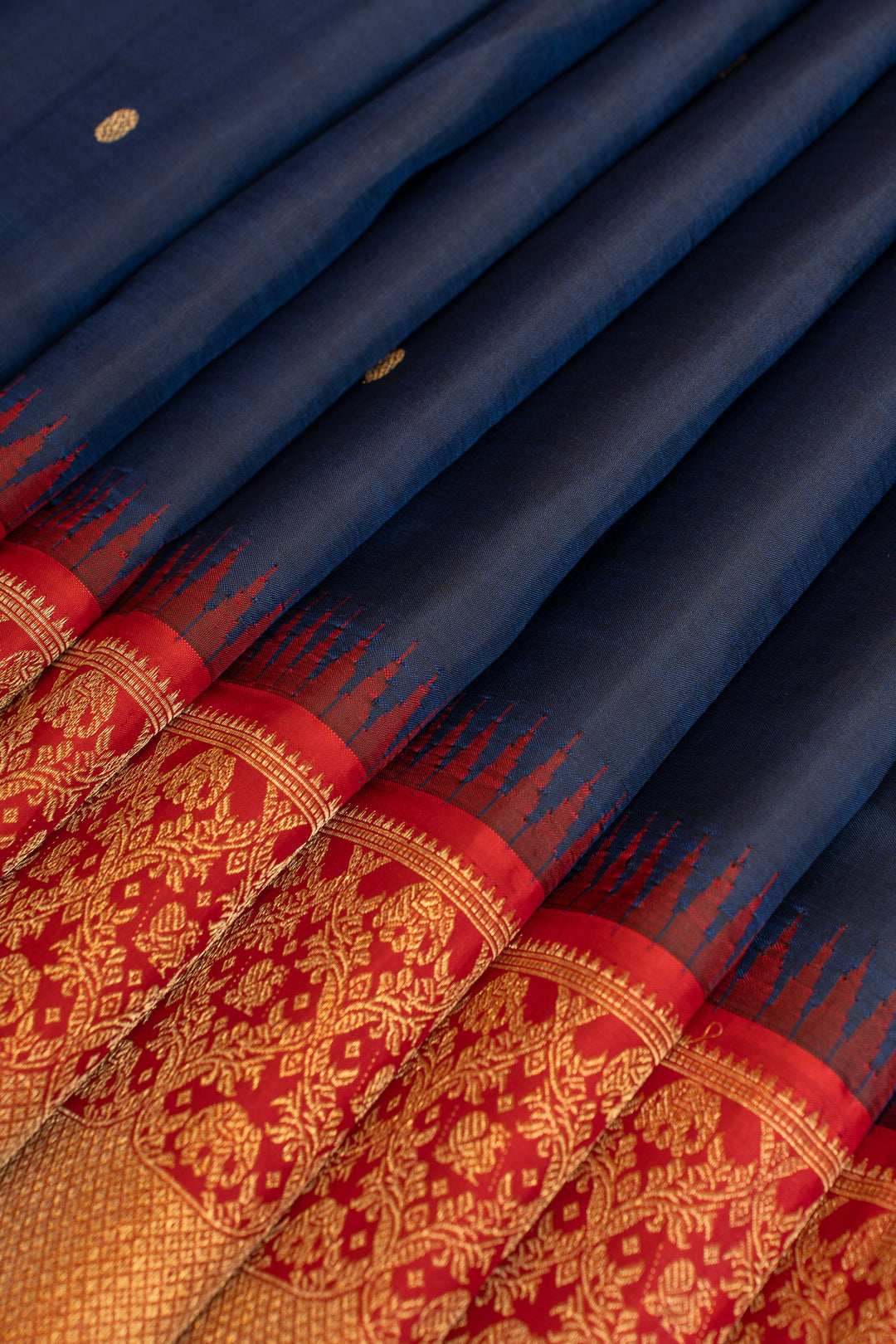 Dark blue and red turning border pure Kanchipuram silk saree