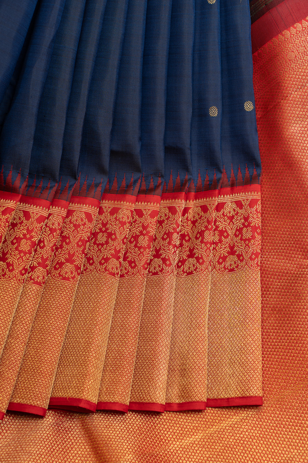 Dark blue and red turning border pure Kanchipuram silk saree