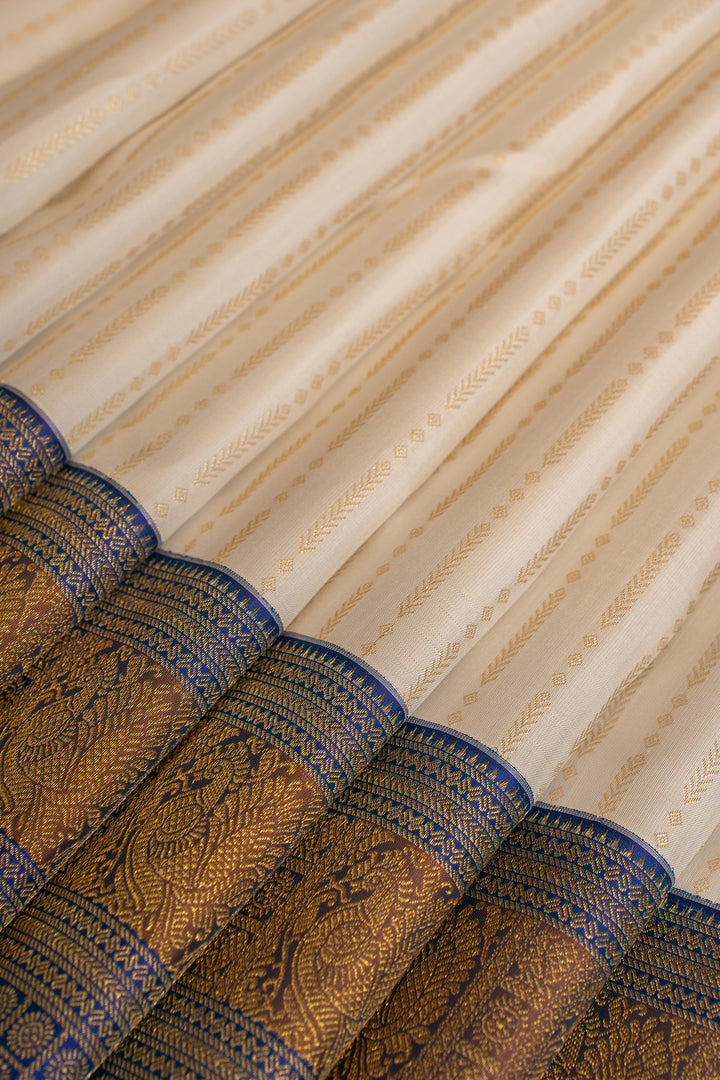 Pearl white and blue turning border pure Kanchipuram silk saree