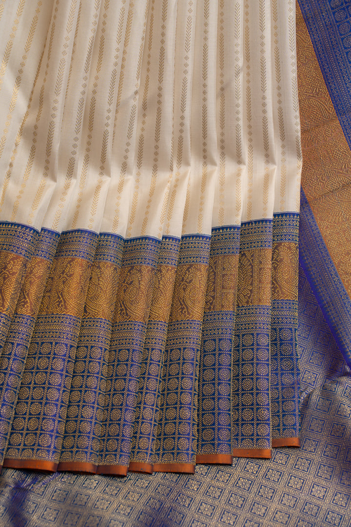 Pearl white and blue turning border pure Kanchipuram silk saree