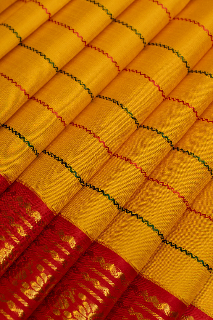 Yellow and red neli thread stripes  pure Kanchipuram silk saree
