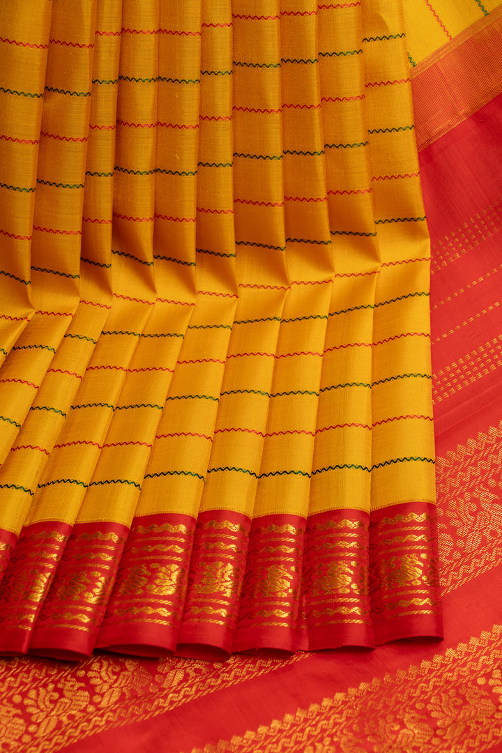 Yellow and red neli thread stripes  pure Kanchipuram silk saree