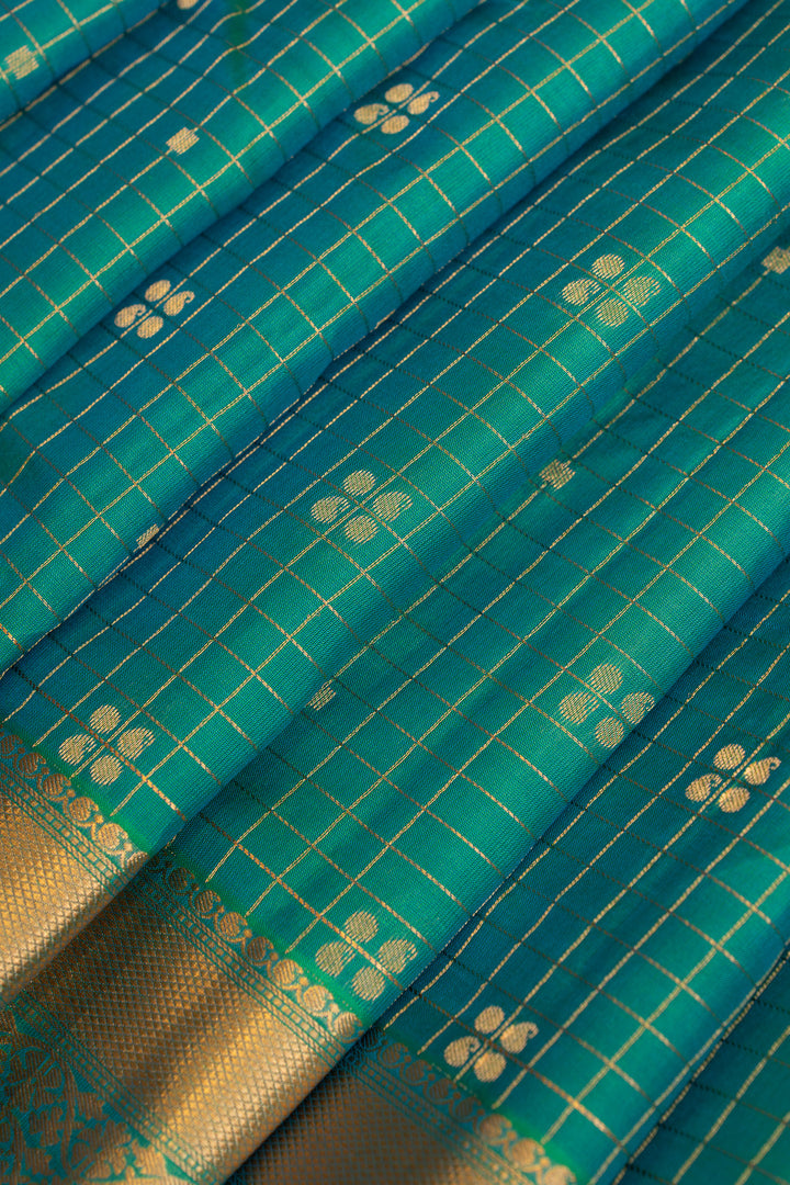 Peacock blue border pure  Kanchipuram silk saree