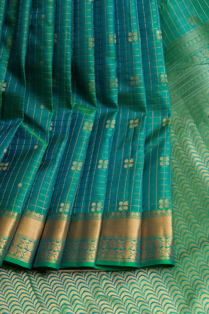 Peacock blue border pure  Kanchipuram silk saree