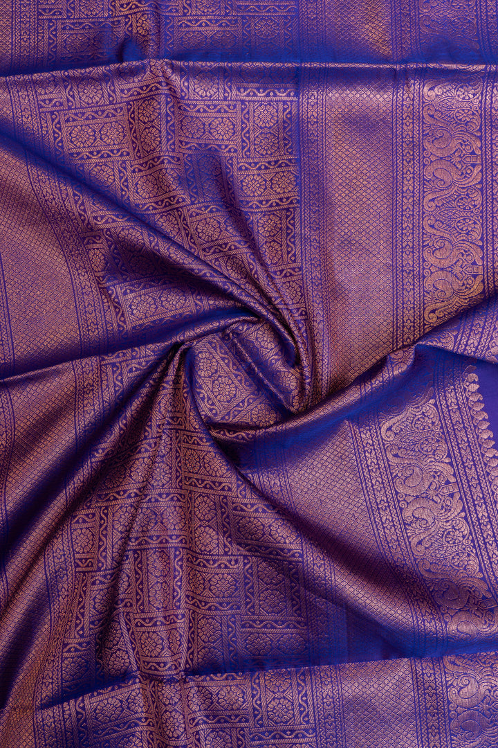 Purple orange zari checks small
Border pure Kanchipuram silk saree