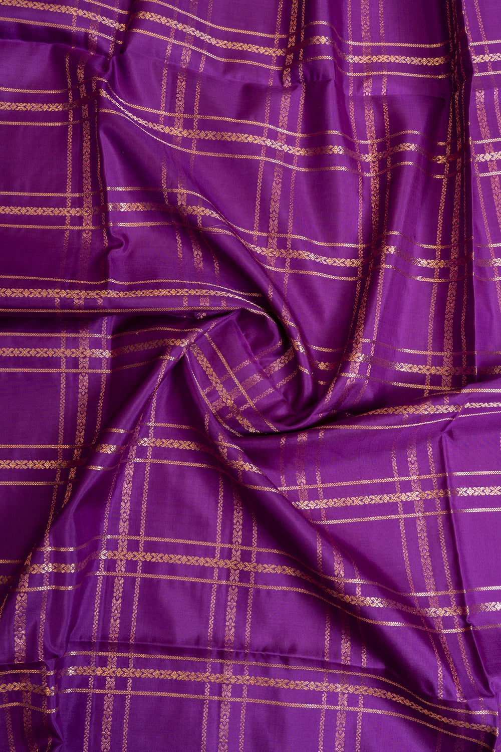 Purple orange zari checks small
Border pure Kanchipuram silk saree