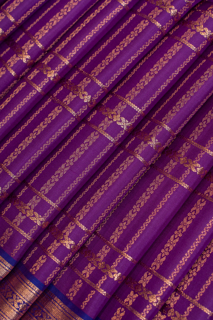 Purple orange zari checks small
Border pure Kanchipuram silk saree