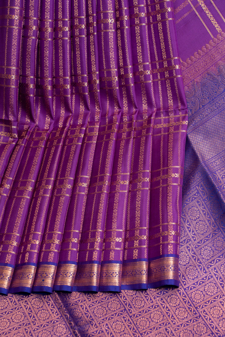 Purple orange zari checks small
Border pure Kanchipuram silk saree