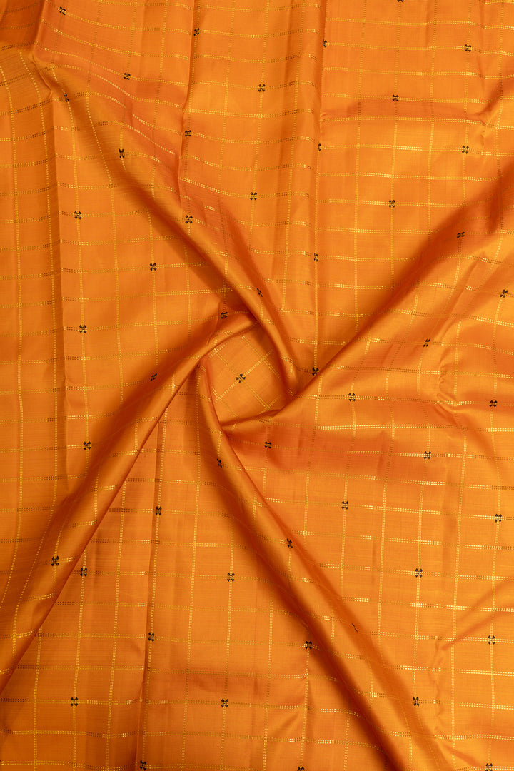 It’s orange and grey pure Kanchipuram silk saree