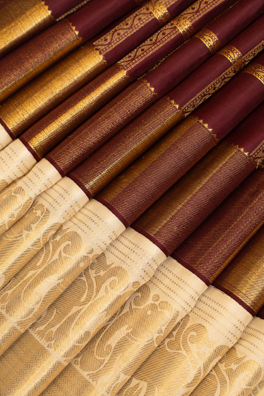 Jamun maroon and ivory yazhi border pure Kanchipuram silk saree