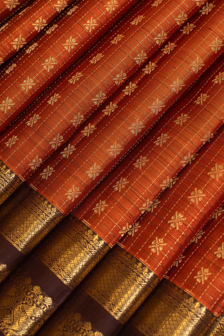 Rust orange and brown zari panel pure Kanchipuram silk saree