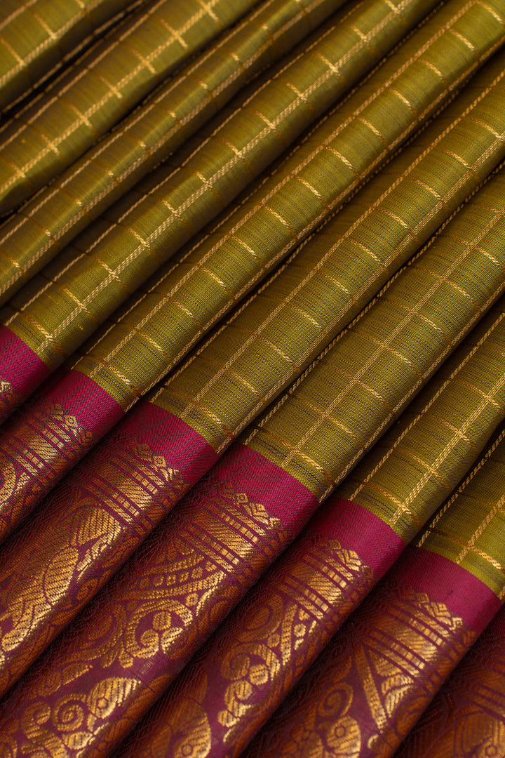 Mehendi  green checks and magenta pure Kanchipuram silk saree