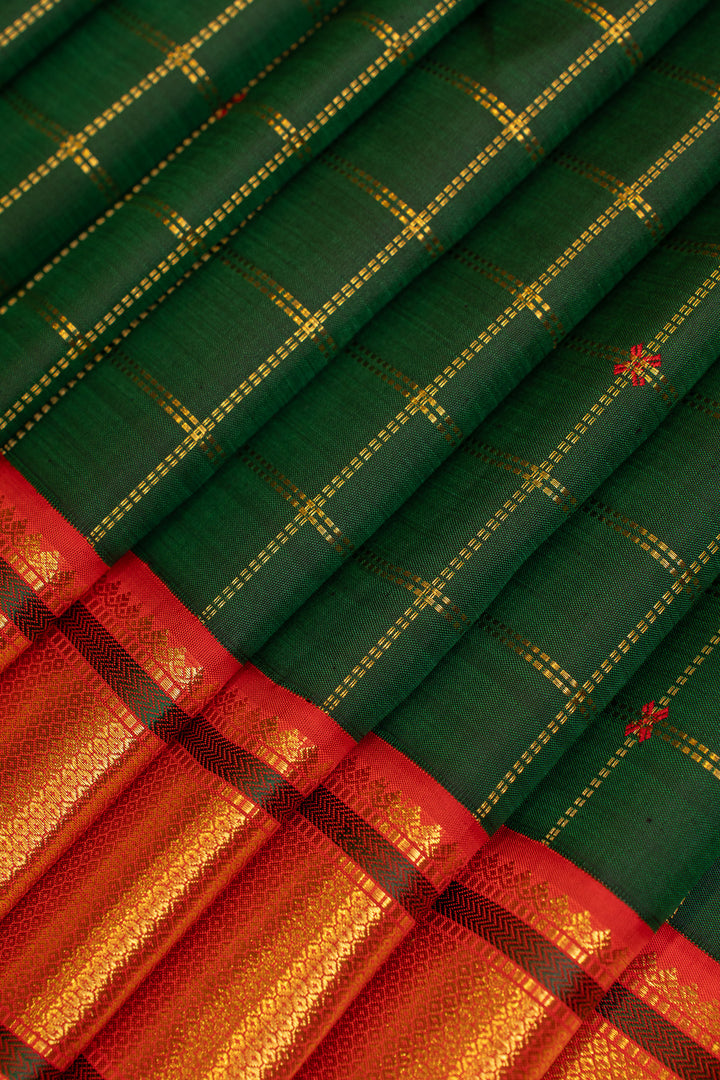 Emerald green zari checks pure Kanchipuram silk  saree