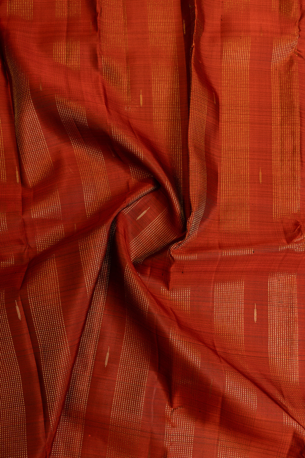 Rust orange zari panel pure Kanchipuram silk saree