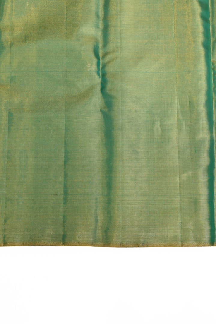 Close-up of green fabric with a subtle pattern