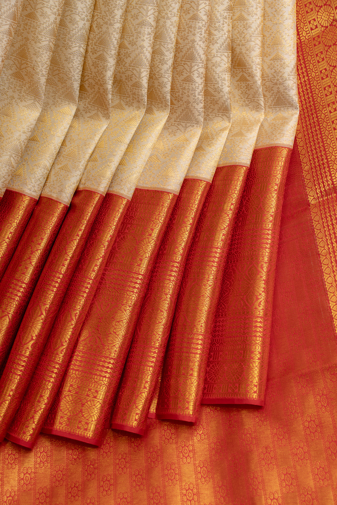Ivory and red brocade pure Kanchipuram silk  saree
